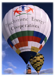 The 69,000 cubic-foot Touchstone Energy® hot air balloon measures 72 feet tall and 53 feet wide when fully inflated and is a professionally flown and managed, competitive balloon operated by Cooperative Balloon Associates, LLC. Touchstone Energy® is a nationwide alliance of more than 560 consumer-owned, locally-operated utilities, such as WFEC, that provide high quality, affordable service to customers and their communities.